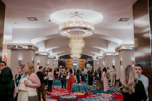 lobby at conference with attendees networking