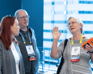 attendees chatting during networking hour