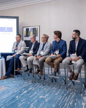 Battery Plus employees doing a panel during a breakout session in Florida
