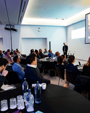 attendees during a breakour session looking at screen