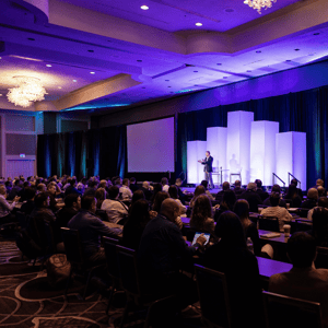 attendees watching a sales kickoff meeting