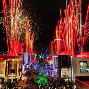 fireworks in a city during a corporate event