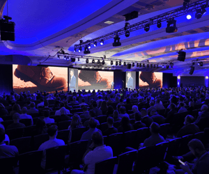 group of attendees watching a conference 
