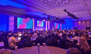 group of attendees watching a franchise convention