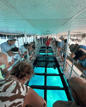 franchise incentive trip attendees on a glass boat ride