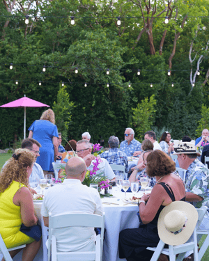 franchise attendees having dinner outside