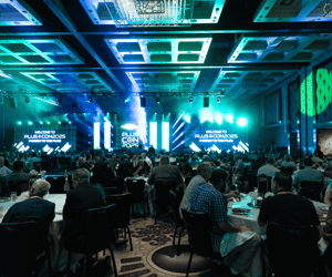 group of franchise attendees attending a conference