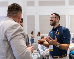 group of attendees networking during a happy hour