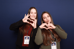 two project managers at a corporate event