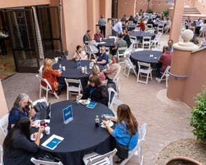 lunch table with people talking outside