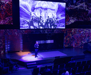 speaker presenting at a user conference