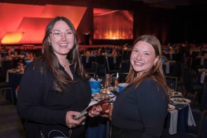two event staff at a sales kickoff