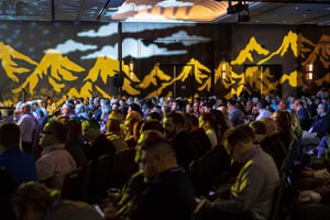 group of attendees watching a sales kickoff meeting