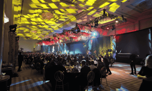 group of event attendees watching a sales kickoff event in puerto rico