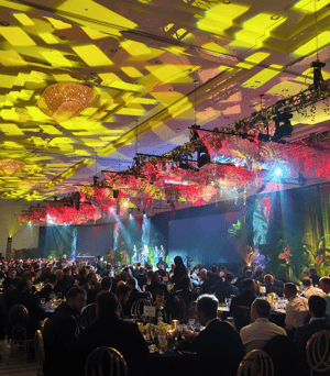 general session of sales kickoff conference with multi-colored lights