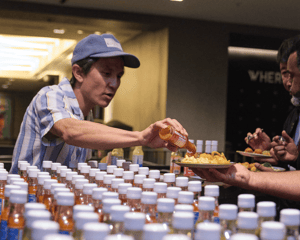 vendor of a hot sauce tasting